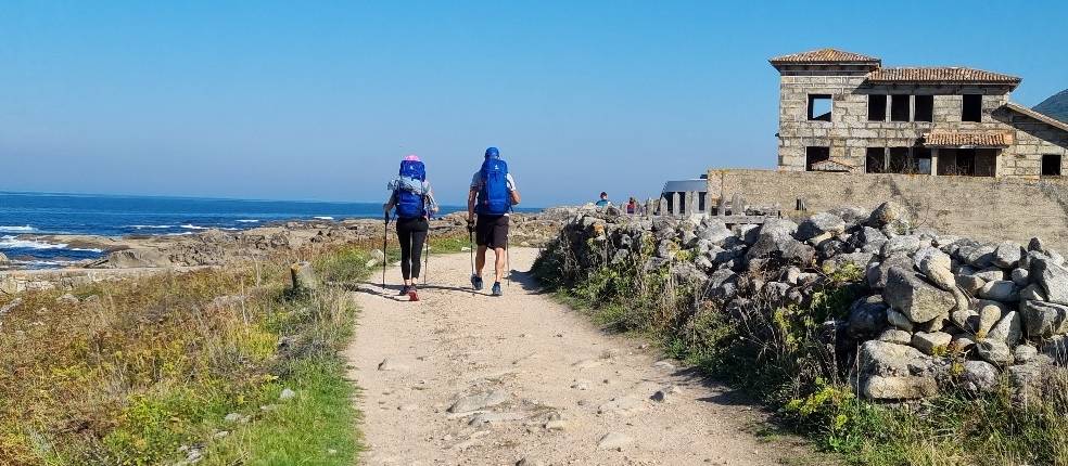 Pilgrims walking the coastal way of the Portuguese Camino |  <i>John Parker</i>