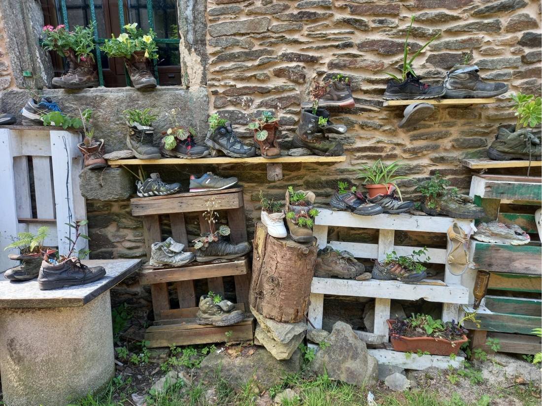 Recycled boots make great vases on the Camino |  <i>Margaret Sacree</i>