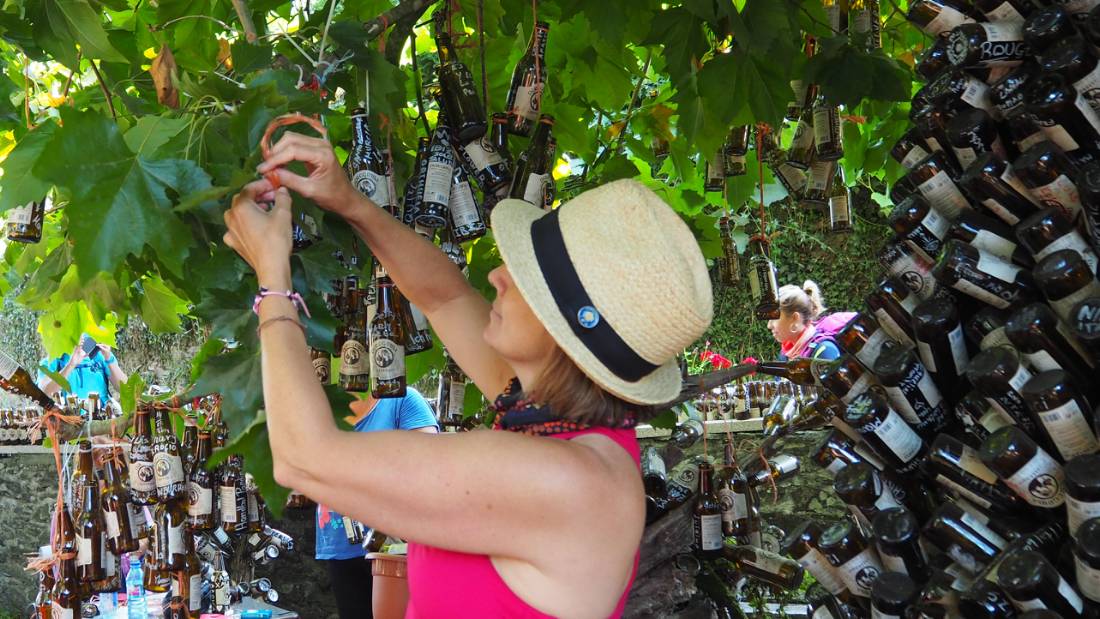 Make a wish when you hang your beer bottle in the Pilgrim's beer garden on the Camino