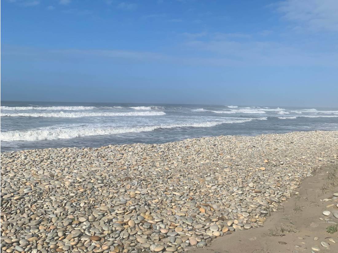 Pebbly beach in Portugal |  Desrae Cameron