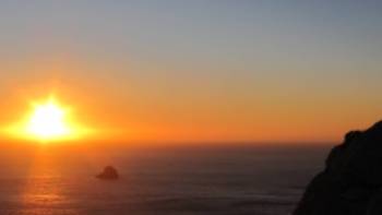 Watching the sunset over Finisterre at the end of the Camino de Santiago,Marissa Ward Cape Finisterre, Galicia Spain