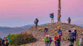 A magnificent sunrise at the Cruz de Ferro on the Camino de Santiago