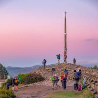 A magnificent sunrise at the Cruz de Ferro on the Camino de Santiago | Burkard Meyendriesch