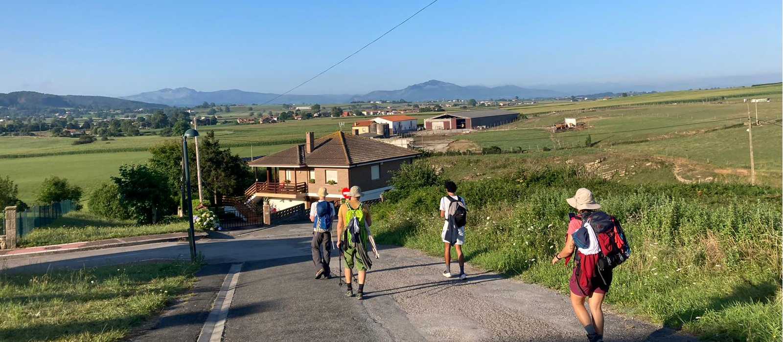 Hikers on the Camino del Norte walking into Comillas | Lachlan Baker