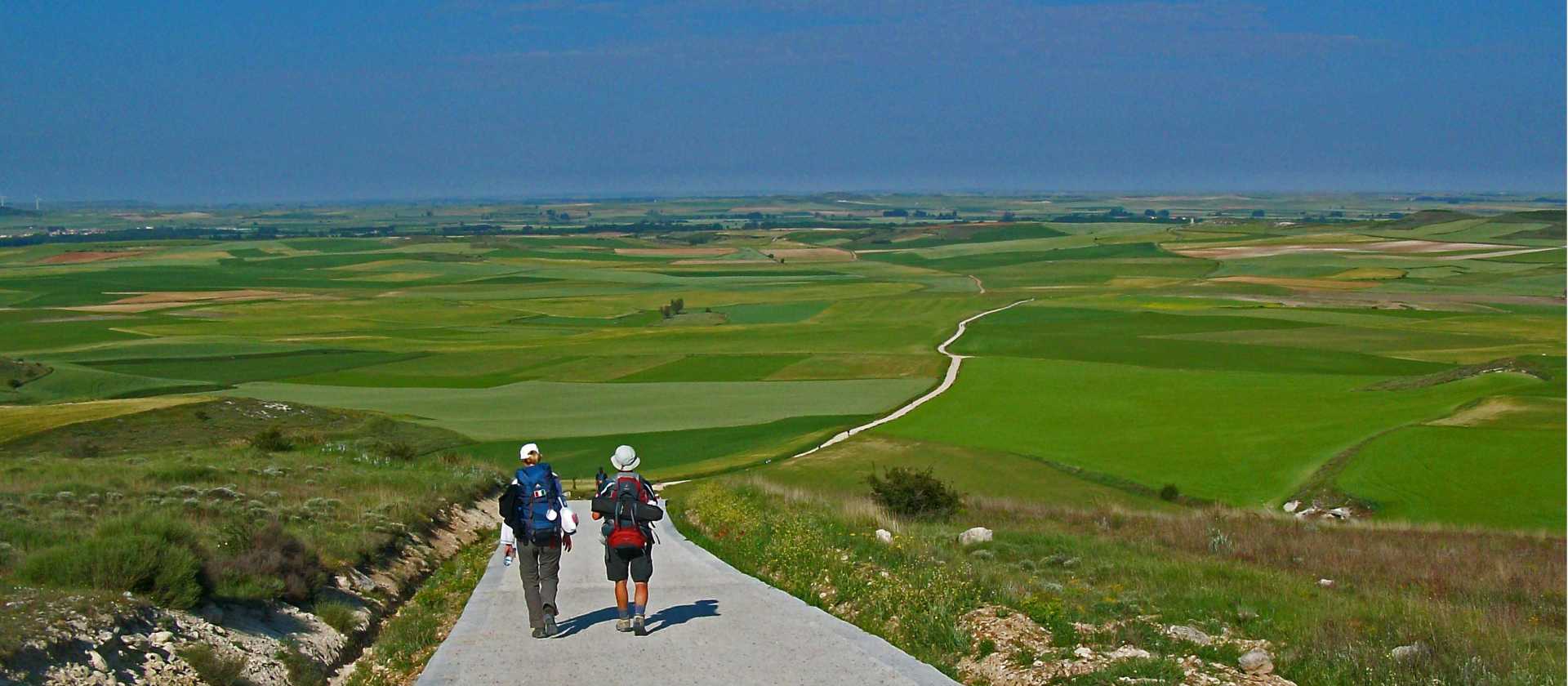 A couple of pilgrims making their way along the Camino de Santiago | Wolfgang Schwenk