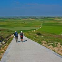 A couple of pilgrims making their way along the Camino de Santiago | Wolfgang Schwenk