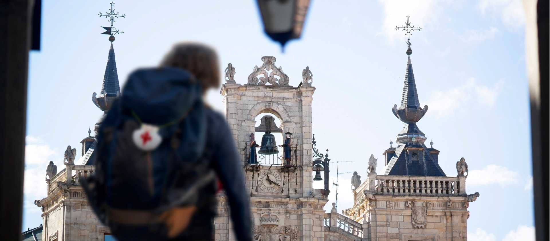 A pilgrim reaches the main square in Leon, Spain, on the Camino