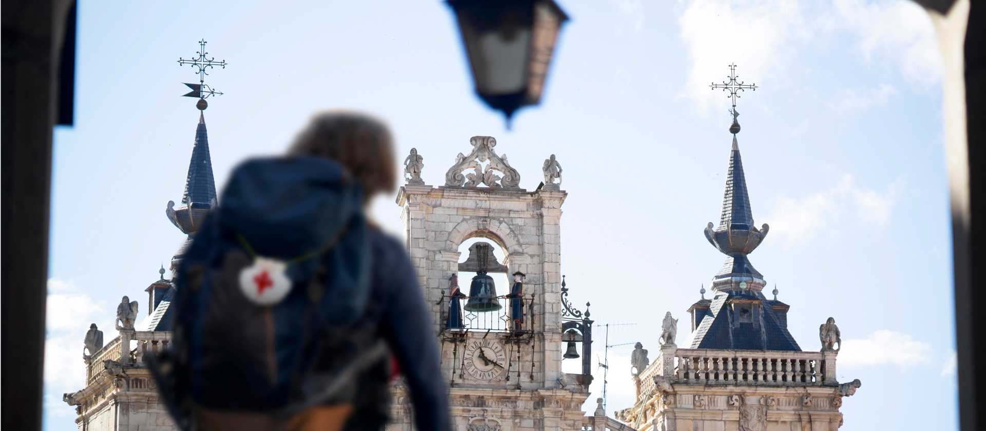 A pilgrim reaches the main square in Leon, Spain, on the Camino