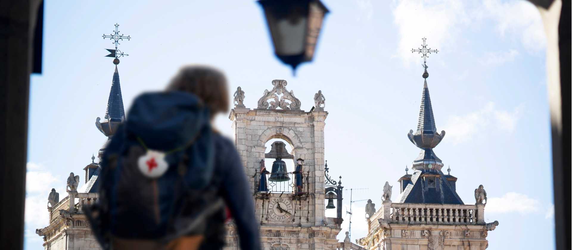 A pilgrim reaches the main square in Leon, Spain, on the Camino