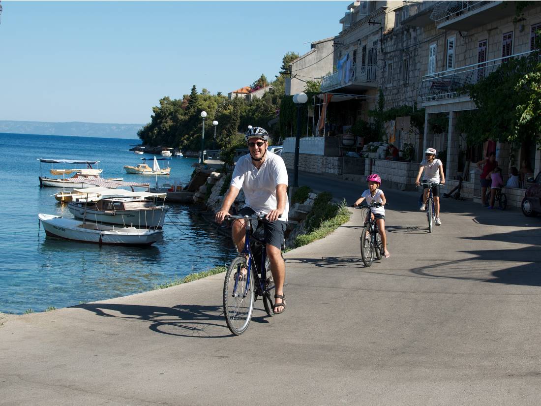 Cycling past boats on the Croatian islands with kids |  <i>Ross Baker</i>