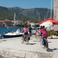 Children cycling into the town of Jelsa on the island of Hvar | Ross Baker