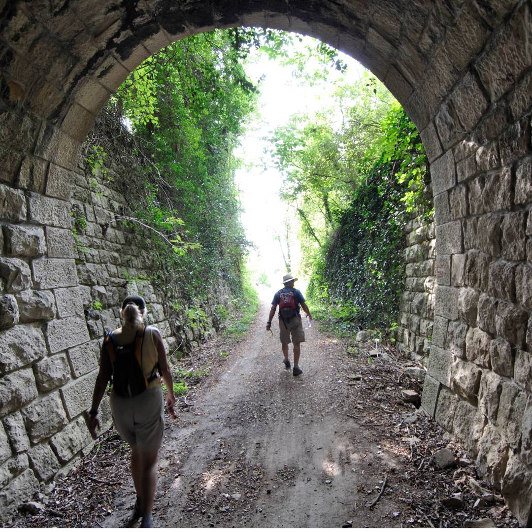 Walking through an old Parenzana Railway tunnel
