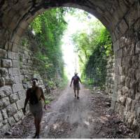 Walking through an old Parenzana Railway tunnel