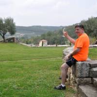 Cyclist enjoying a glass of wine in Istria