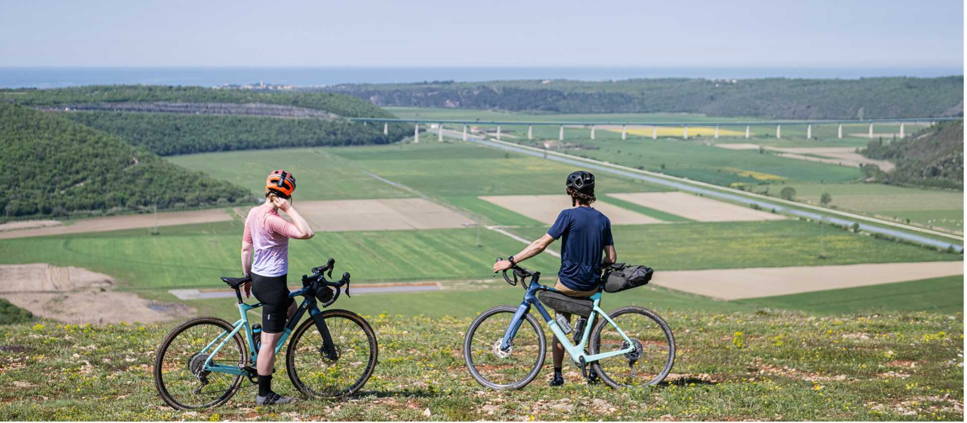 Cyclists taking in the view on the Parenzana Cycle trail in Croatia
