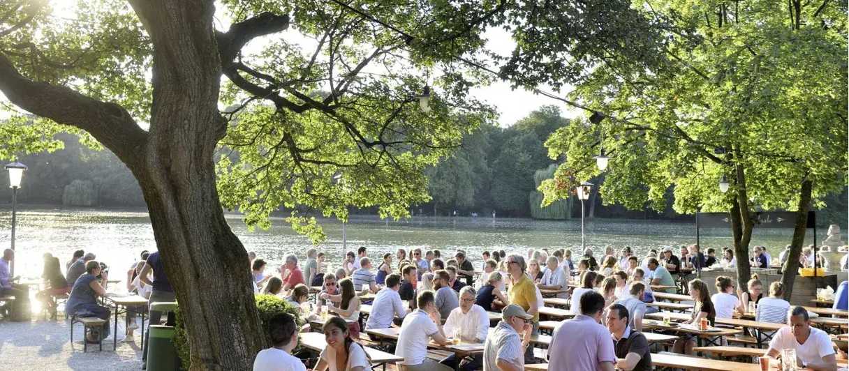 Relax by the water at Seehaus Biergarten with a classic Paulaner in hand | Falk Heller