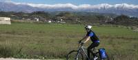 Cyclist on a quiet road in Albania