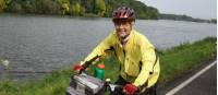 A happy cyclist following timeless river landscapes to Dresden