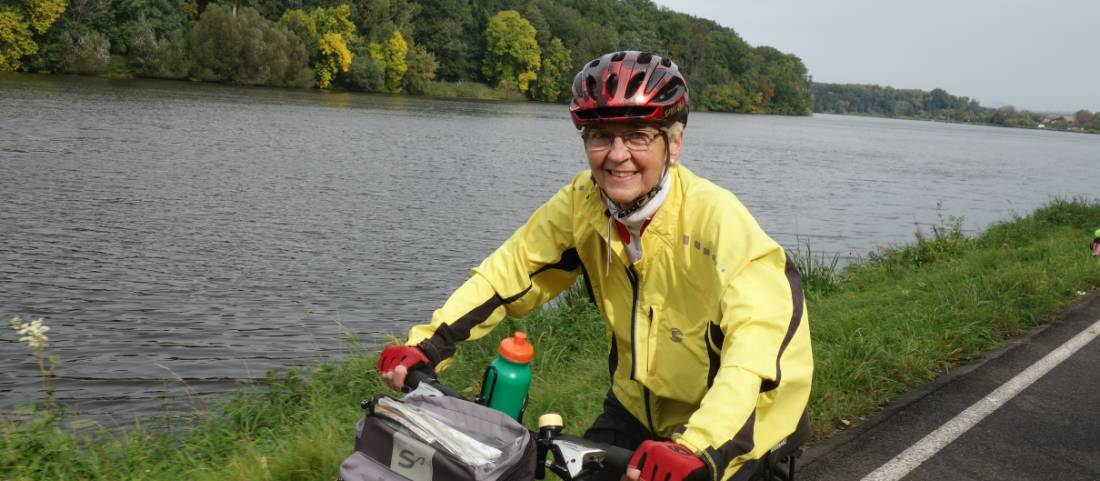 A happy cyclist following timeless river landscapes to Dresden