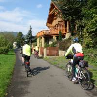 Cycling past traditional houses near Ústí nad Labem