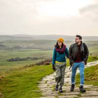 A happy couple following the Pennine Way trail in Derbyshire. | Andrew Pickett