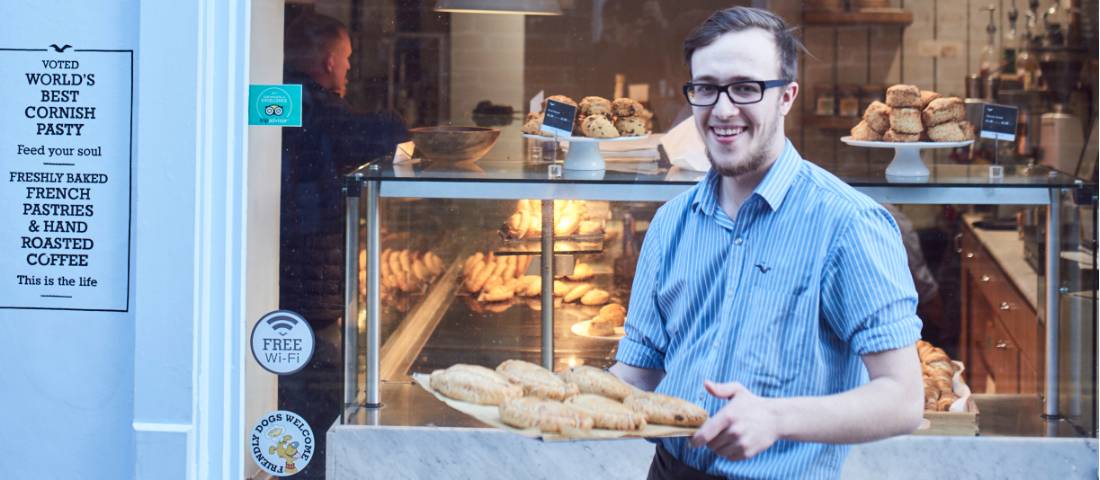 Sampling Cornish pasties at a local bakery.