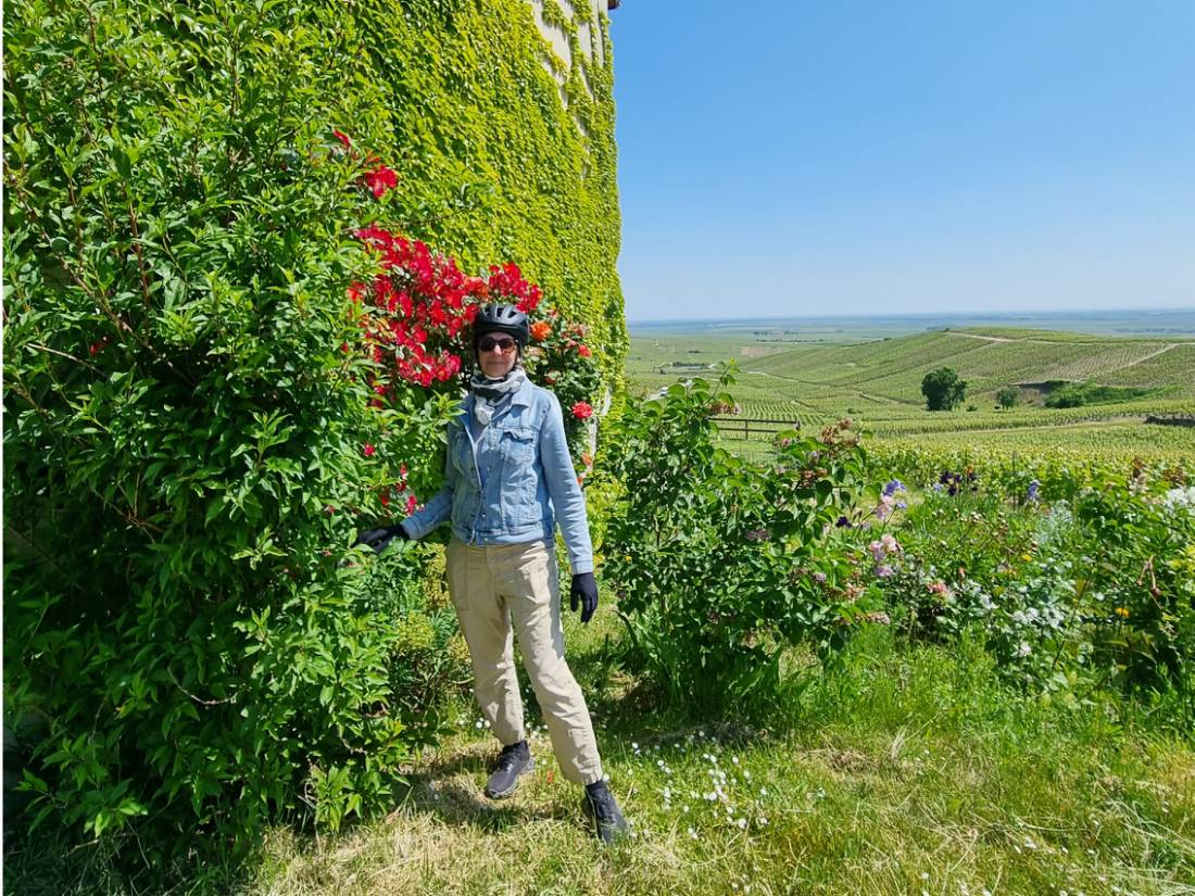 Cyclist finding a leafy backdrop for a photo |  <i>Sue Marr</i>
