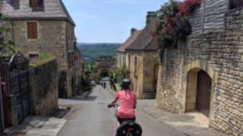 Cycling in the village of Domme