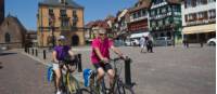 Cycling through a small village in Alsace