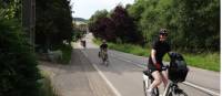 Cyclists on a quiet road between Metz and Frouard in the Lorraine region of France