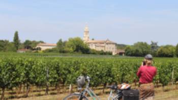 Cyclist stopping to take a photo in Bordeaux