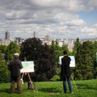 Artists in Buttes Chaumont park in Paris, France