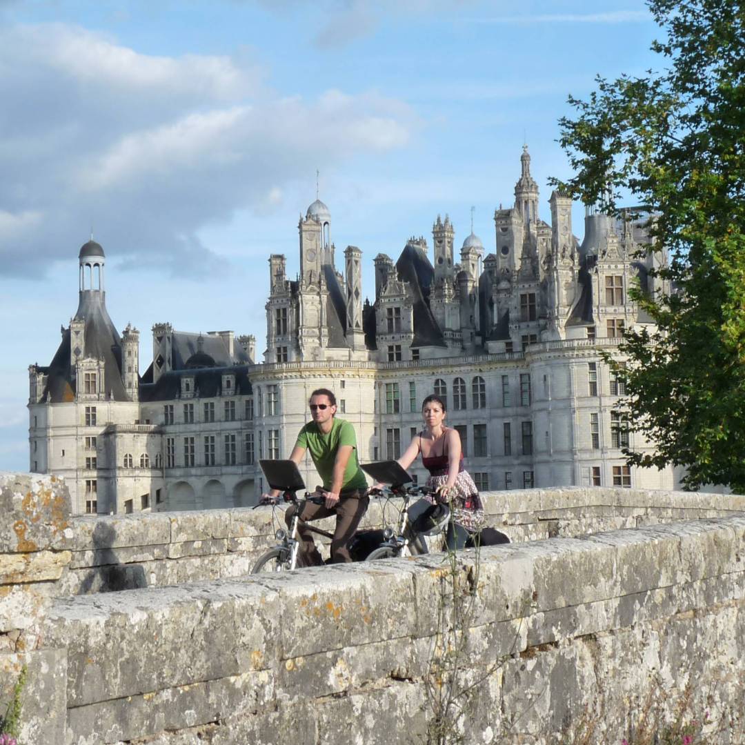 Cycling at Chambord chateau, Loire Valley