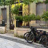Cyclists in St Emilion, France | Tali Emdin