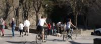 Cyclists around the ramparts of Carcassonne Languedoc France | Kate Baker