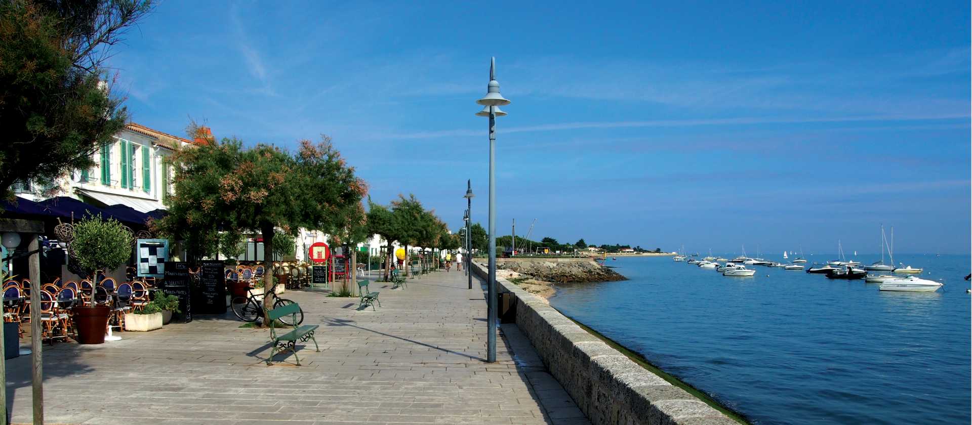 Walking along the colourful waterfront in La Rochelle | Nick Kostos