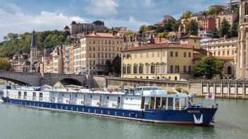 MS Provence passing by the bridges in Lyon