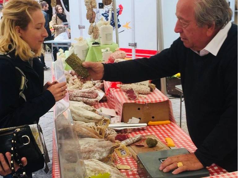 Sampling some local meat at a farmer's market in France |  <i>Allie Peden</i>