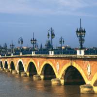 The Pont de Pierre spans the Garonne River in Bordeaux | Tourism d' Aquitaine