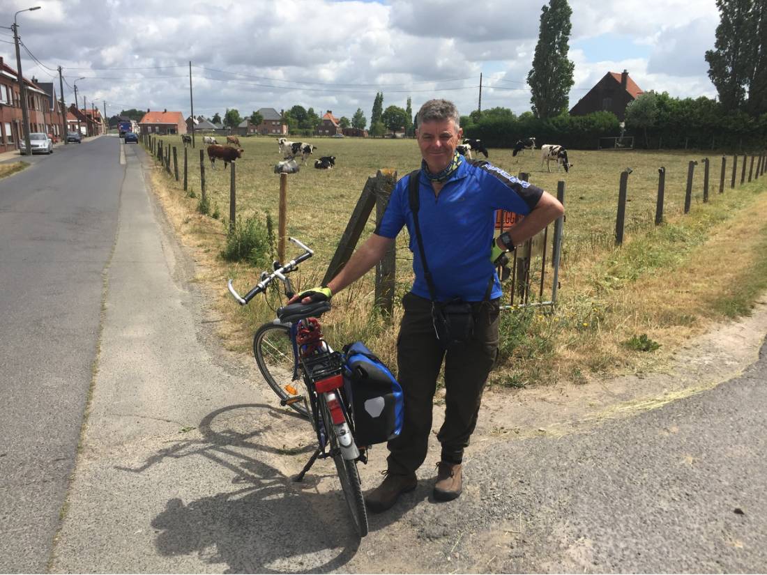 Cyclist at Molenaarelst, where his grandfather was wounded during the war |  <i>Richard Tulloch</i>