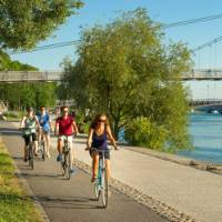 Cyclists on the Rhone Cycle Way in Seyssel