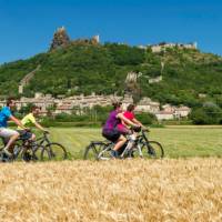 Cycling past historic villages on the Rhone Cycle way