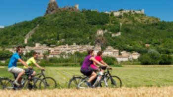 Cycling past historic villages on the Rhone Cycle way