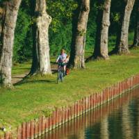 A local returning from the 'boulangerie' enjoys the view | Michael Gebicki