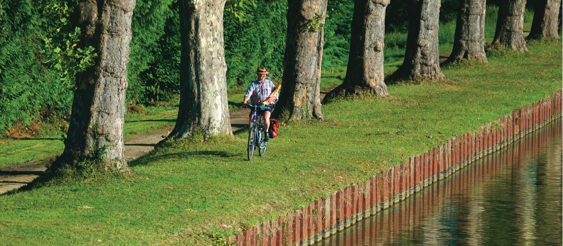 A local returning from the 'boulangerie' enjoys the view | Michael Gebicki
