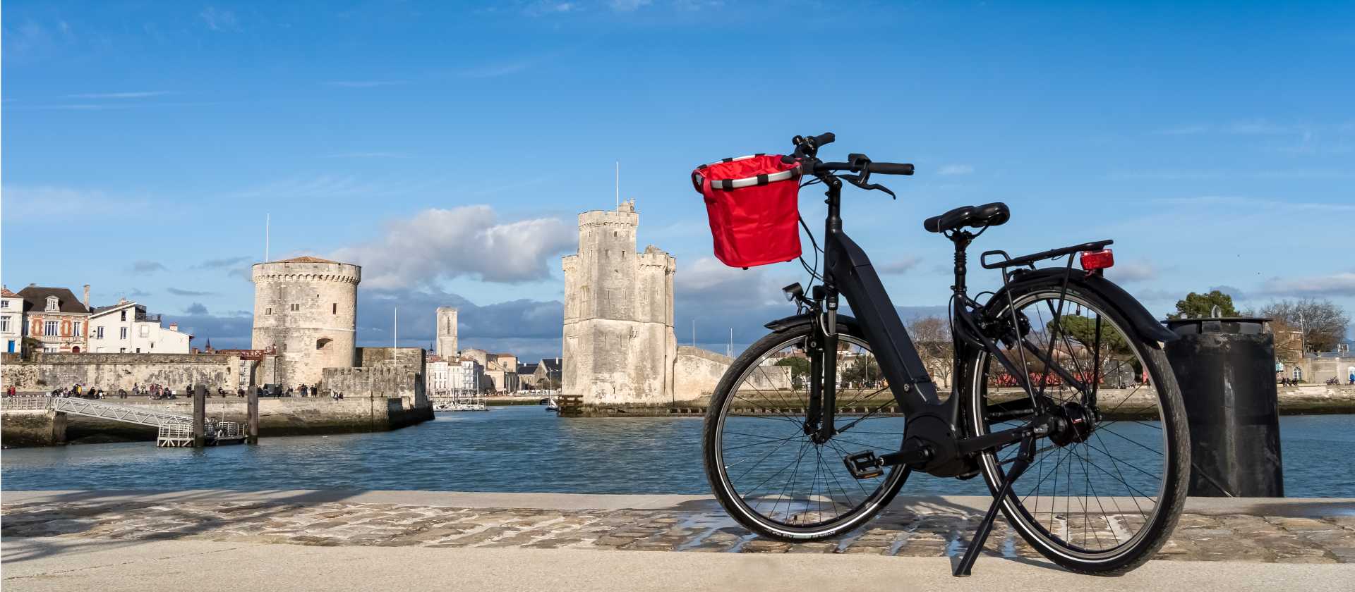 Cycle around the old harbour of La Rochelle in France