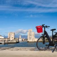 Cycle around the old harbour of La Rochelle in France
