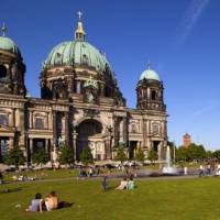 Berlin Cathedral provides a superb backdrop for those relaxing in Lustgarten Park | Joachim Messerschmidt