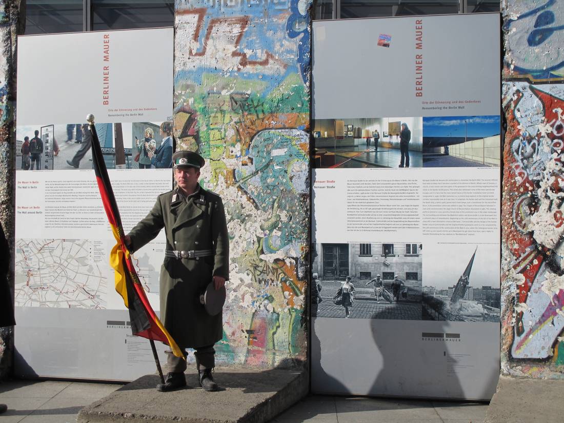 Posing as an East German Guard defending the wall in Berlin |  <i>Kate Baker</i>