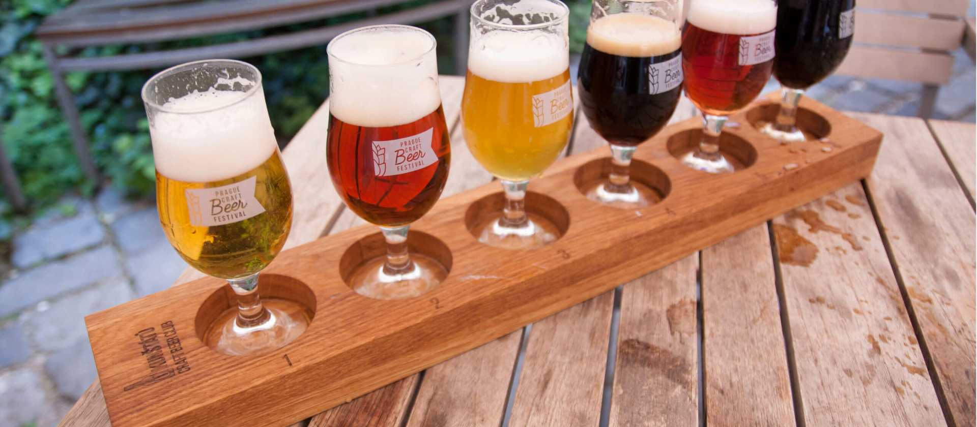 Sampling Czech craft beer flights at a historic Old Town beer garden